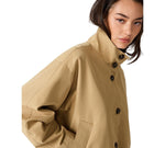 Steve Madden Fayden Jacket in tan/khaki with dark buttons, high collar, oversized fit, worn by a model, close-up front view.