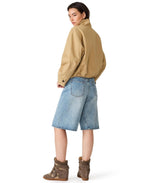 Steve Madden Fayden Jacket in tan/camel, back view on model styled with denim shorts and wedge sneakers