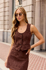 Steve Madden Fontana Vest in dark chocolate brown suede-texture, button-front with patch pockets, worn by model with mini skirt