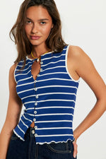 Free People Tilly Striped Tank in Navy Combo — blue and white horizontal stripe ribbed sleeveless top with button front and lettuce hem, worn by model