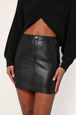 FEELS LIKE FALL VEGAN LEATHER MINI SKIRT