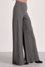 Elan Wide Leg Pants in dark grey heather fabric, high-waist with pintuck seams, shown on model with black patent shoes