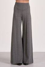 Elan Wide Leg Pants in dark grey heather fabric, high-waisted with center seam detail, front view on model