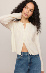 Z SUPPLY Medina Pointelle Cardigan in Cloud, cream cable-knit button-front cropped cardigan worn by model with blue jeans, front view