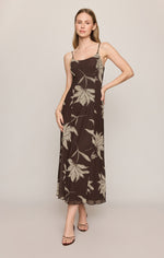 Z SUPPLY Charisma Floral Midi Dress in dark chocolate with cream lily print, spaghetti straps, cowl neck, on model, front view
