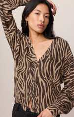 Z SUPPLY All The Wild Cardigan in dark chocolate zebra print, button-front V-neck, worn by model, front view