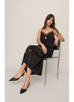 Z SUPPLY Kori Lace Inset Cami in black satin with lace trim at neckline and hem, worn by model seated on metal chair