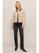 Z SUPPLY Rey Cropped Chore Jacket in Soapstone, front view on model styled with black jeans and ankle boots