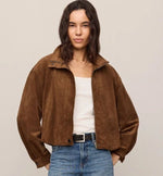 Z SUPPLY Corin Bubble Hem Jacket in Saddle Suede brown, worn open over white tank with jeans, front view on model