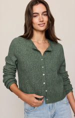 Z SUPPLY Medina Pointelle Cardigan in Monstera green, cable-knit with button front and collar, worn by model with jeans