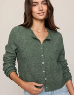 Z SUPPLY Medina Pointelle Cardigan in Monstera green, featuring cable-knit texture, button front, and collar, worn by a model