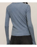 Z Supply Arlet Mini Thermal Top in Mineral Blue, back view on model, long sleeves, waffle-knit texture, paired with black jeans